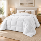 White quilted comforter duvet insert fully spread on a queen bed
