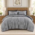 Charcoal grey 7-piece comforter set with sheets styled on a bed