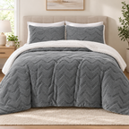 Grey sherpa comforter set with two matching chevron pillowcases on a queen bed